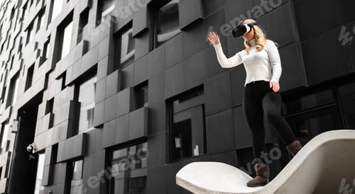 Preview: Environmental Portrait of Woman Using Virtual Reality Glasses and Shoping In Metaverse Business
