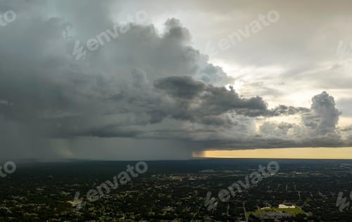 Preview: Landscape of dark ominous clouds forming on stormy sky during heavy thunderstorm
