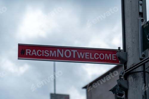 Preview: sign in the city saying Racism not welcome