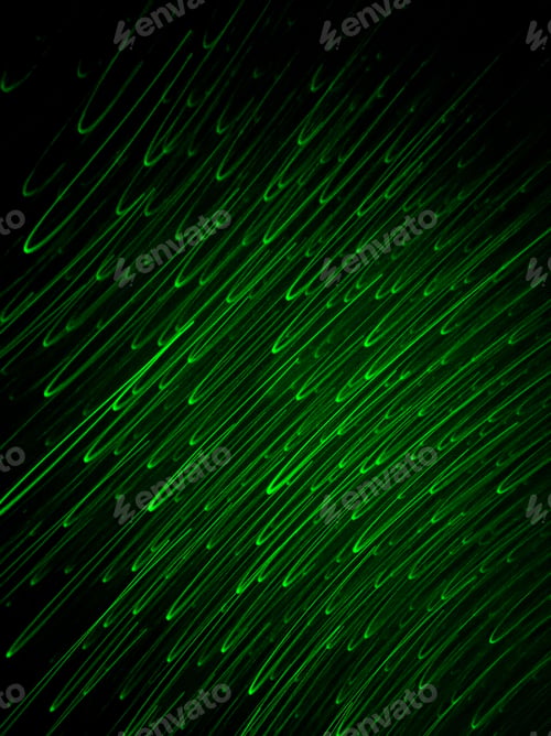 Preview: Vertical shot of abstract black background with green laser lines. Movement of green lights