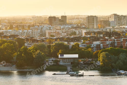 Preview: Danube river and urban skyline of Novi Sad, Serbia at sunset.
