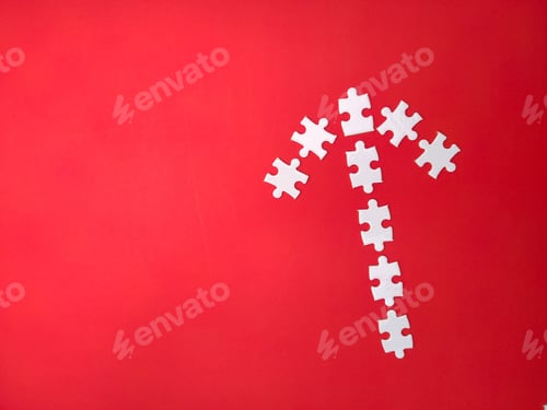 Preview: White puzzles arranged according to the shape of arrows on a red background