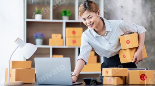 Preview: Young Asian girl Entrepreneurs, SME businesses, check orders and check the purchase order Prepare pa
