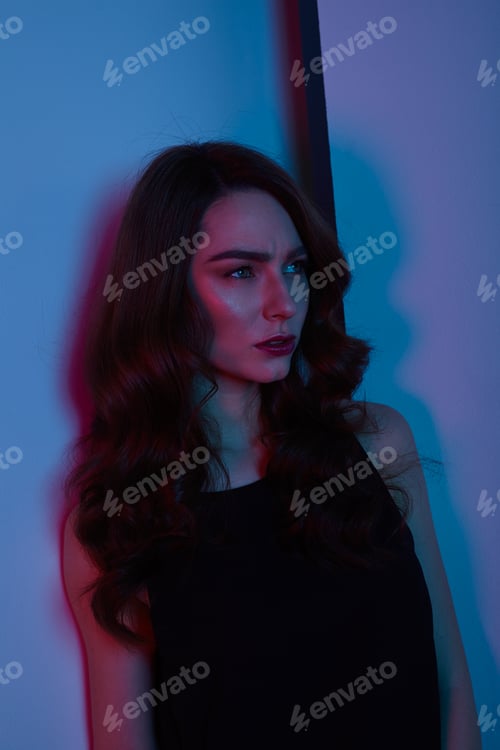 Preview: Thoughtful woman at night
