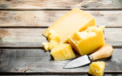 Preview: Parmesan cheese with knife.