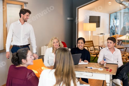 Preview: Business people attending a workshop in the office
