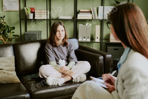 Preview: Child Receiving Counseling Session in Office Setting