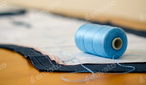 Preview: Spool of thread in a sewing workshop