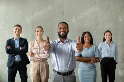 Preview: Successful Business Team. Black Male Ceo Posing With Smiliing Employees In Office