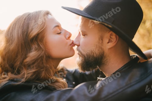 Preview: Happy couple in love kissing and hugging.