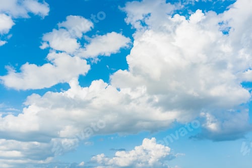 Preview: Clouds and blue sky. Cirrus and cumulus clouds on blue sky background.