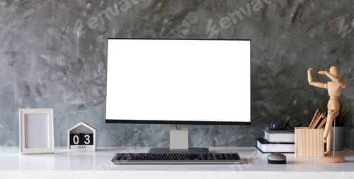 Preview: Creative designer desktop with blank white laptop screen with mockup poster on white desk
