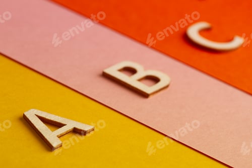 Preview: A B and C letters of the alphabet on colored paper background
