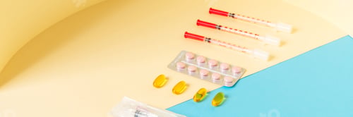 Preview: The set of a medical devices consisting of syringes, jar, tablets, ampoules standing in the studio