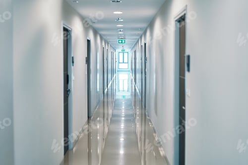 Preview: Long empty corridor in modern building