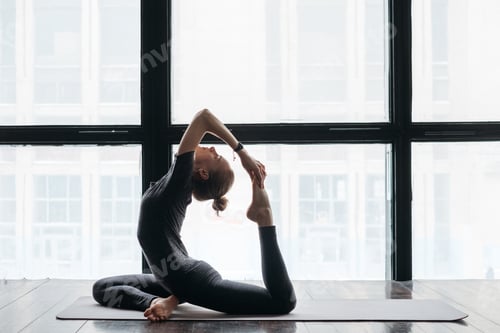 Preview: Woman doing morning yoga
