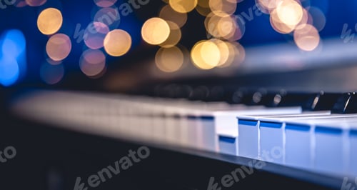 Preview: Piano keys close-up on a blurred background with bokeh.