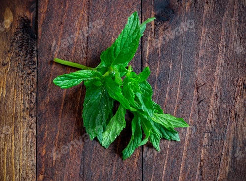 Preview: Mint leaves on wood