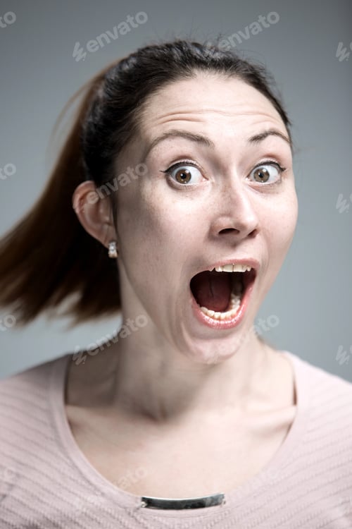Preview: Portrait Of Young Woman With Shocked Facial Expression