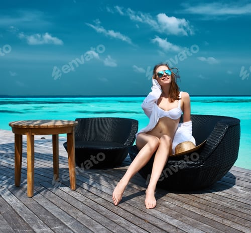 Preview: Woman On A Tropical Beach Jetty At Maldives