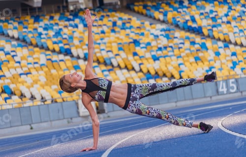 Preview: Fitness Trainer. Girl Doing Exercises At The Stadium