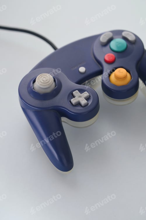 Preview: Photo of a blue joystick video game controller
