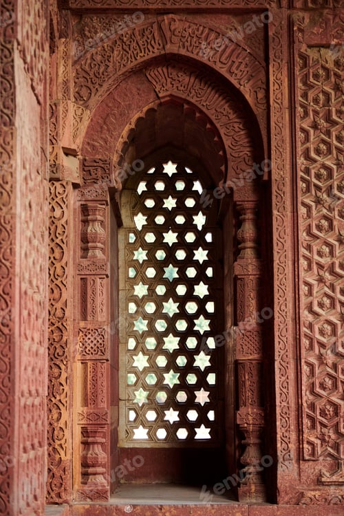 Preview: Decorative window shutters of Alai Darwaza landmark part of Qutb complex in South Delhi, India,