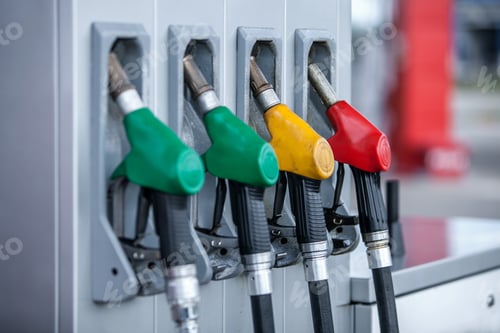 Preview: Closeup of multicolored gas pumps at the gas station