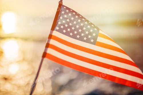 Preview: Usa national America flag at seaside background as symbol of democracy us memorial day 4th of july