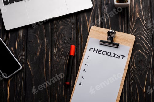 Preview: top view of gadgets near checklist and red marker pen on table, e-commerce concept