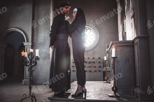 Preview: Nun and priest praying and spending time in the monastery