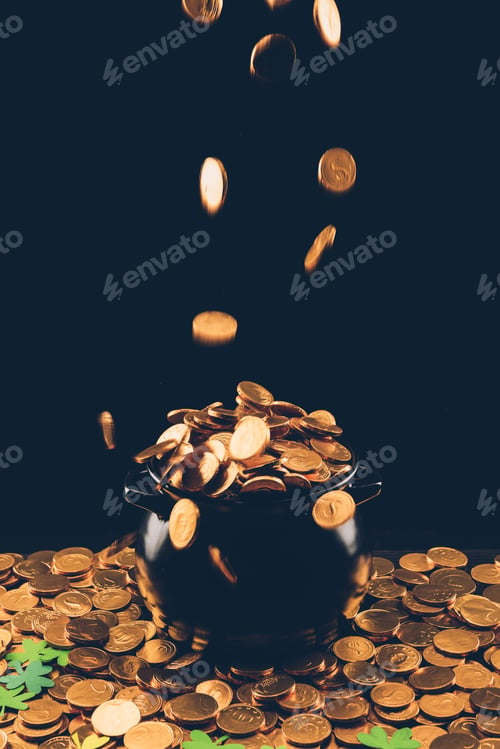 Preview: golden coins falling in pot, st patricks day concept