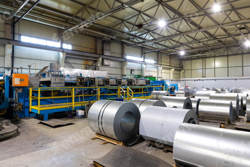 Preview: Photo of steel roofing forming machine. Industrial machine for metal sheet roof coils cut. Factory