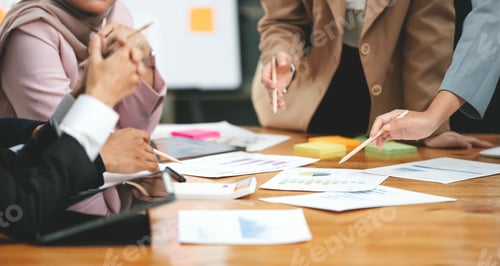 Preview: Young colleagues discuss business, calculate financial statistics and analytical research ideas.