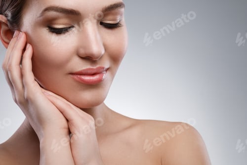 Preview: Young woman with beautiful face and soft skin