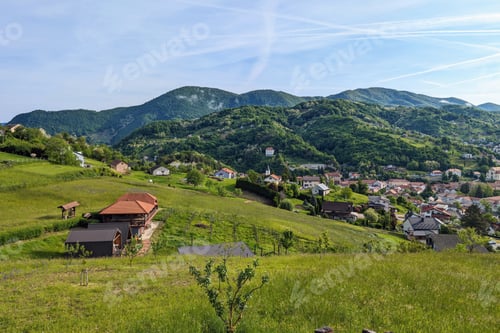 Preview: Hillside landscape, house on green hill, mountains in background, Krapina, Croatia, Hrvatsko zagorje