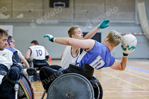 Preview: Men in wheelchairs playing pararugby