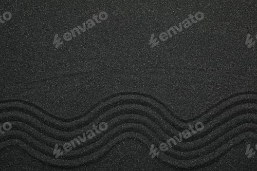Preview: Top view of beautiful black sand. Zen and harmony