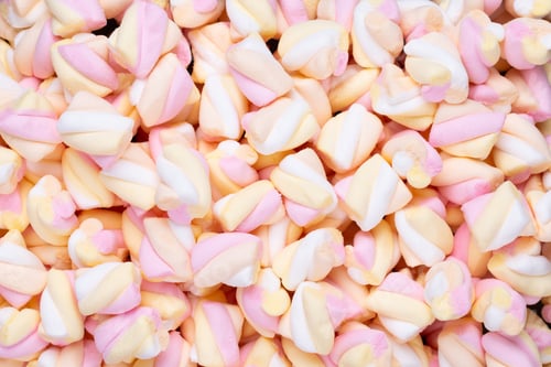 Preview: Colorful marshmallows background with copy space.