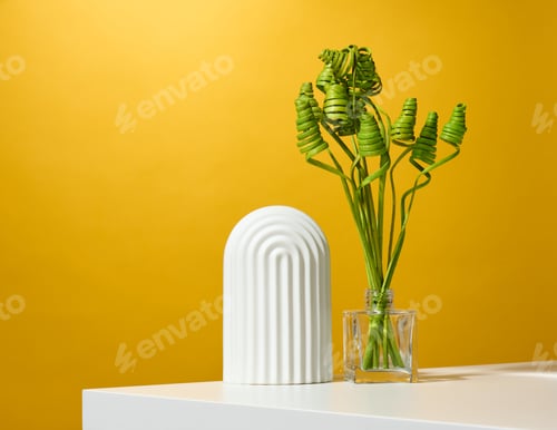 Preview: Transparent vase with green plants and a white arch on a yellow background
