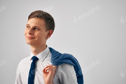 Preview: business man with a jacket in his hands self-confidence lifestyle manager