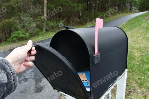Preview: Mailing a small package and envelopes with cards. Putting mail in the mailbox for pickup.