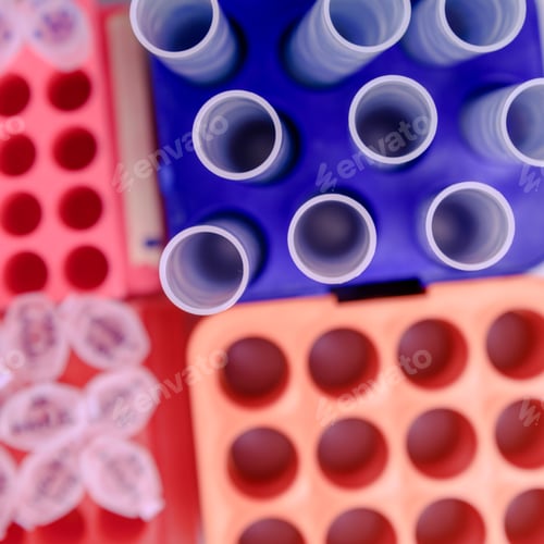 Preview: High angle closeup shot of laboratory plastic tubes used for coronavirus research