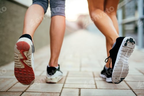 Preview: Closeup of joggers' feet