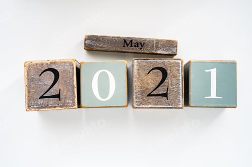 Preview: Numbers wood block cubes isolated on white background. 2021 May New Year abstract design concept