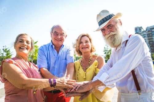 Preview: Group of senior people bonding outdoors