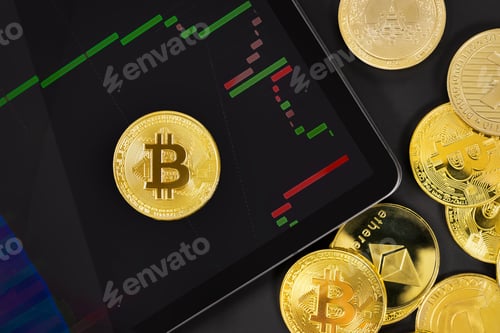 Preview: Bitcoin on digital tablet with exchange graph by crypto coins