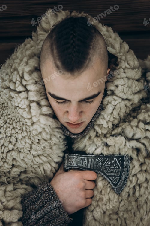 Preview: Viking portrait, strong handsome viking warrior with steel axe ritual before battle
