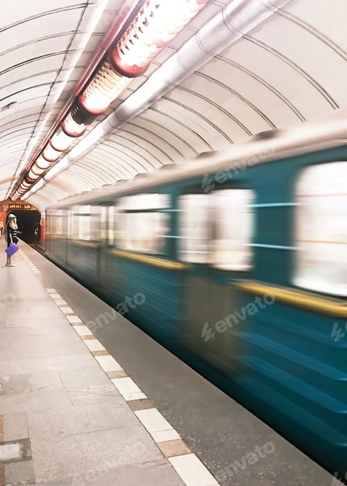 Preview: Young woman waiting for a train at subway station