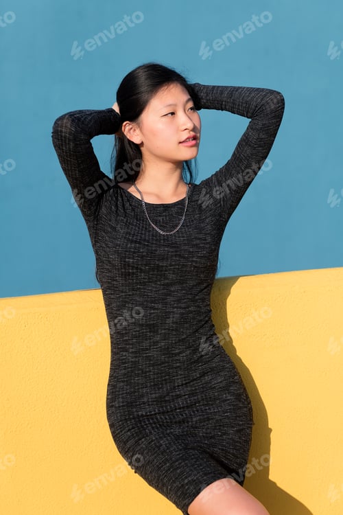 Preview: sensual chinese woman posing in a tight dress